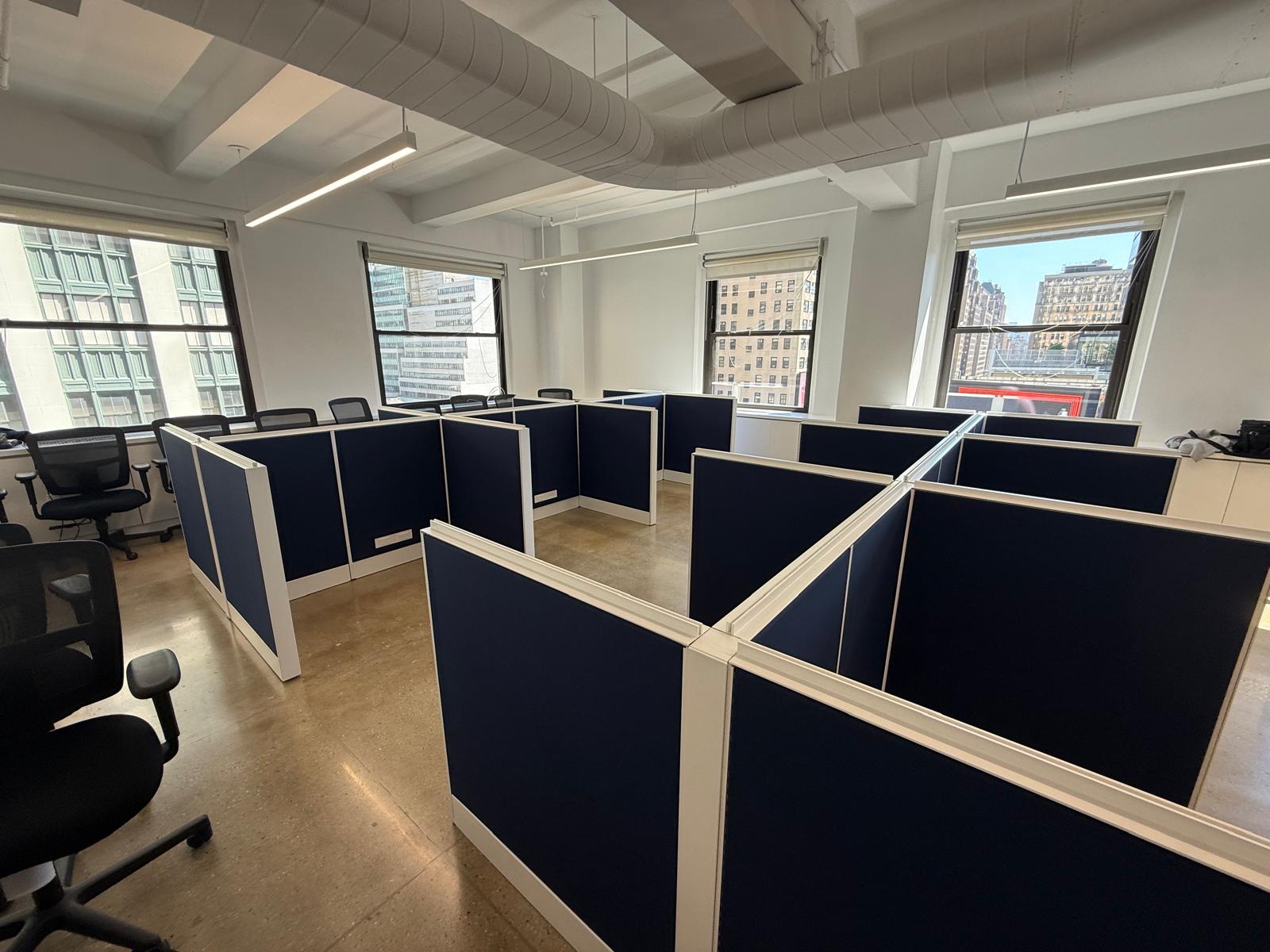 Finished cubicle bullpen with city view
